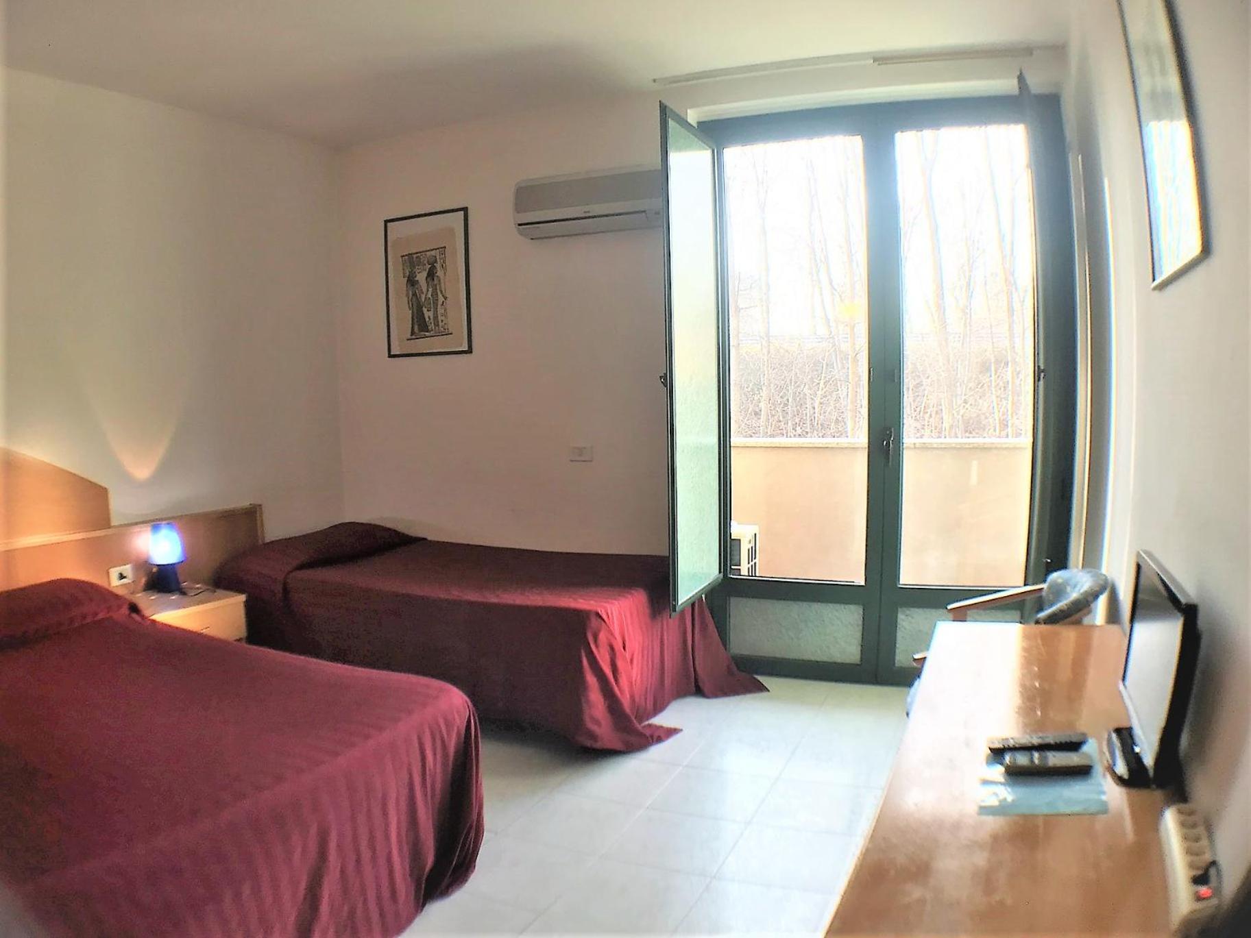 Ascot Lodging Cardano Al Campo Zimmer foto
